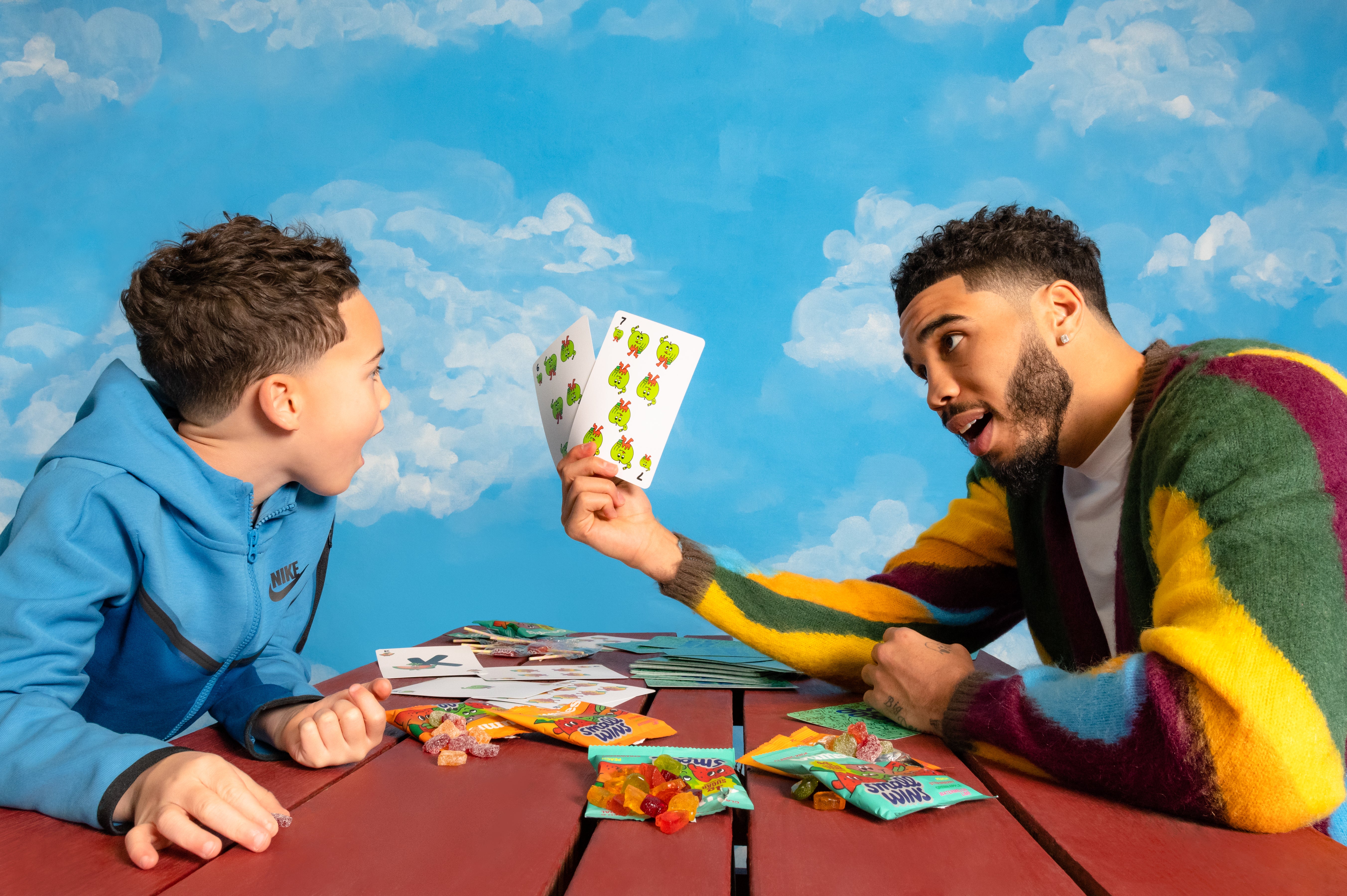 Father and Son at Table with Candy